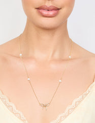Gold Plated Station Pearl Diamante Bow Pendant Necklace