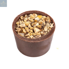 Butter caramel - smooth butter caramel in a milk chocolate cup topped with roasted hazelnuts 13.7g