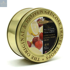 Gold embossed tin of citrus flavour travel sweets