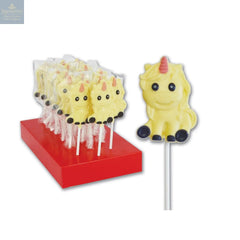 Hand decorated white chocolate Una the unicorn lollipops in display