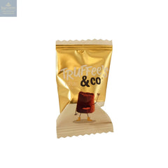 Plain - cocoa dusted French truffles in gold flow wrap. approx 400pcs