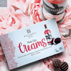 Whitakers dark chocolate covered pink gin fondant creams in carton
