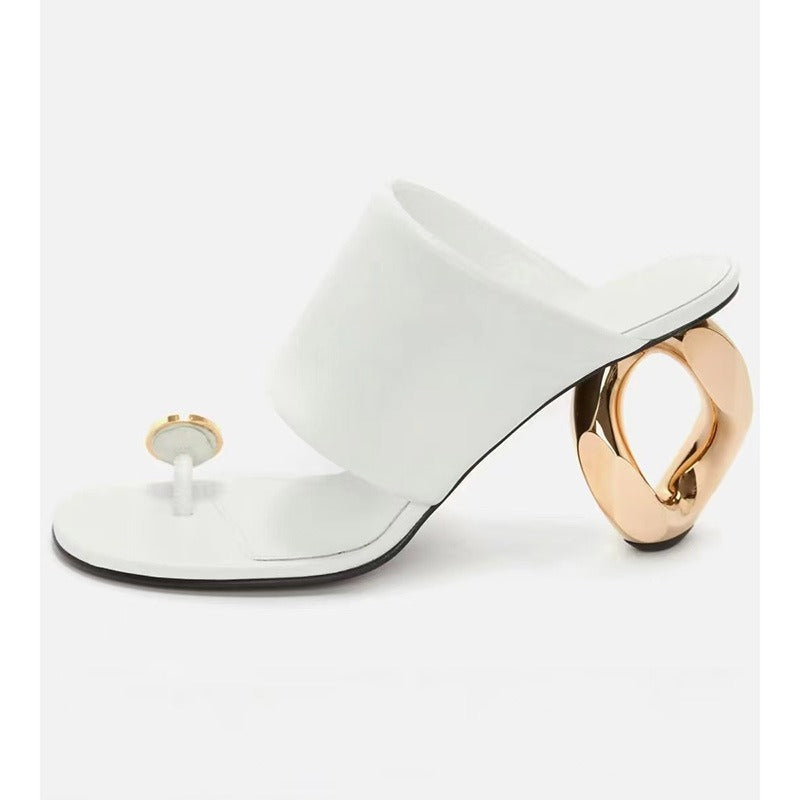 Glamorous high heel slides featuring a hint of sparkle and a comfortable, rounded toe