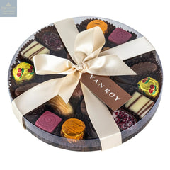 Assorted Belgian chocolates in 18cm cello round with ribbon