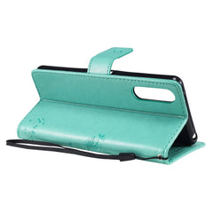 Tree & Cat Embossed Pattern Horizontal Flip Leather Case with Holder & Card Slots & Wallet & Lanyard, For Sony Xperia 10 II