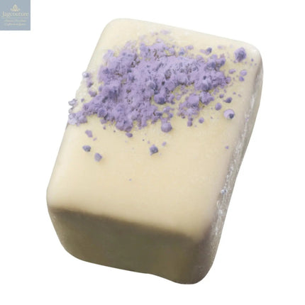 Nefertiti - white chocolate soft ganache with powdered violet décor 18.1g