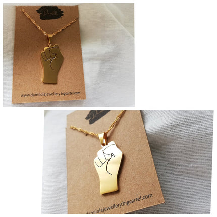 'United We Stand' Fist Necklace - Gold/Silver