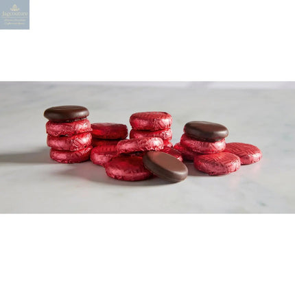 Raspberry crème - dark chocolate covered fondant in magenta coloured foil 120pcs