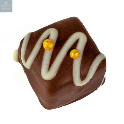 Vine Fruits - rum & raisin fudge in milk chocolate with white stripe and gold balls 19g